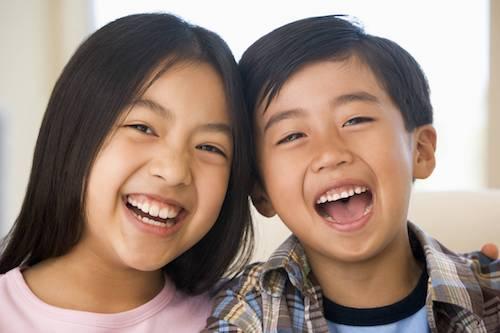 midwest city ok preventive dental treatment | two children laugh together